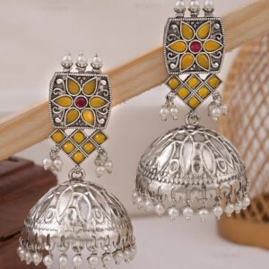 Traditional yellow stone with elegant Jhumks