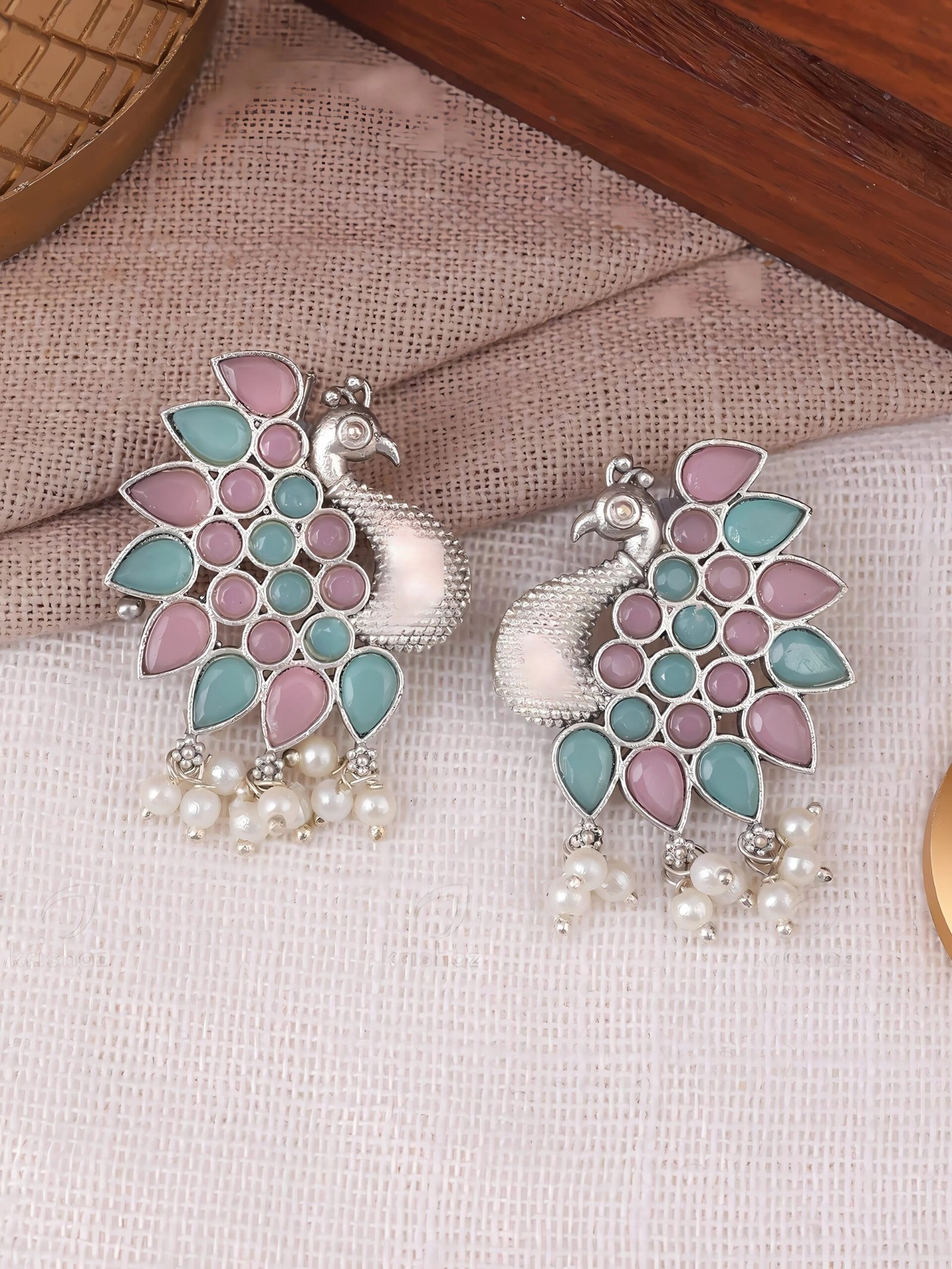 Peacock design with multi stone stud